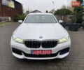 Белый БМВ 7 Серия, объемом двигателя 3 л и пробегом 167 тыс. км за 28000 $, фото 1 на Automoto.ua