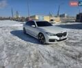 Белый БМВ 7 Серия, объемом двигателя 3 л и пробегом 102 тыс. км за 32500 $, фото 1 на Automoto.ua
