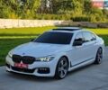 Білий БМВ 7 Серія, об'ємом двигуна 3 л та пробігом 128 тис. км за 28900 $, фото 1 на Automoto.ua