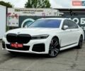 Белый БМВ 7 Серия, объемом двигателя 3 л и пробегом 80 тыс. км за 43500 $, фото 1 на Automoto.ua
