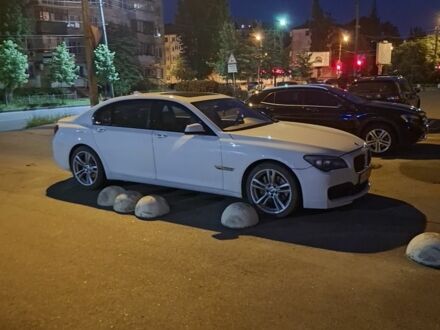 Білий БМВ 7 Серія, об'ємом двигуна 3 л та пробігом 215 тис. км за 15000 $, фото 1 на Automoto.ua