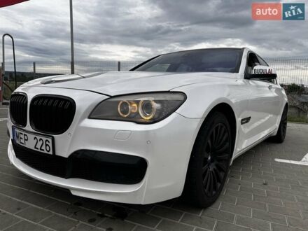 Белый БМВ 7 Серия, объемом двигателя 2.99 л и пробегом 380 тыс. км за 12000 $, фото 1 на Automoto.ua