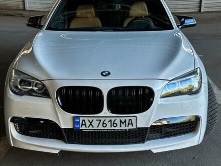 Білий БМВ 7 Серія, об'ємом двигуна 3 л та пробігом 220 тис. км за 15900 $, фото 1 на Automoto.ua