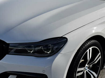 Білий БМВ 7 Серія, об'ємом двигуна 3 л та пробігом 130 тис. км за 31000 $, фото 1 на Automoto.ua