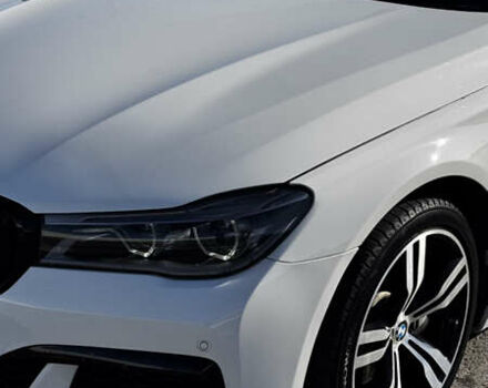 Белый БМВ 7 Серия, объемом двигателя 3 л и пробегом 130 тыс. км за 31000 $, фото 1 на Automoto.ua