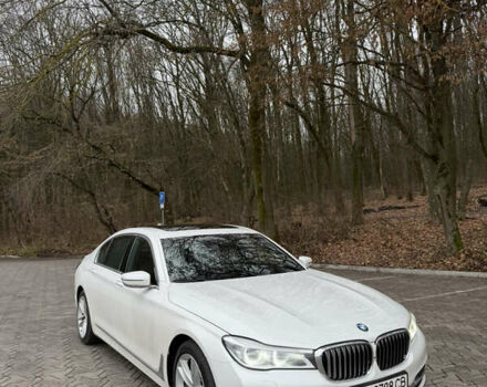 Белый БМВ 7 Серия, объемом двигателя 2.99 л и пробегом 176 тыс. км за 40000 $, фото 1 на Automoto.ua