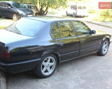 Черный БМВ 7 Серия, объемом двигателя 3 л и пробегом 430 тыс. км за 4700 $, фото 1 на Automoto.ua