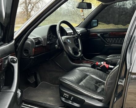 Черный БМВ 7 Серия, объемом двигателя 3 л и пробегом 450 тыс. км за 2200 $, фото 12 на Automoto.ua