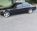 Черный БМВ 7 Серия, объемом двигателя 3 л и пробегом 450 тыс. км за 3200 $, фото 1 на Automoto.ua