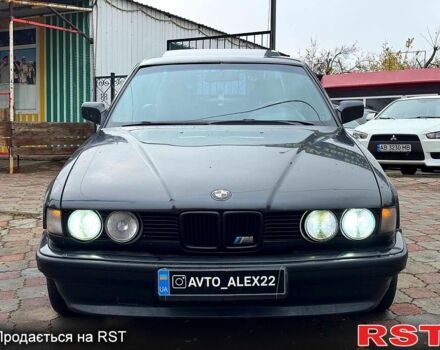 Черный БМВ 7 Серия, объемом двигателя 3.5 л и пробегом 300 тыс. км за 2499 $, фото 1 на Automoto.ua