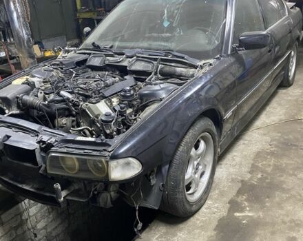 Чорний БМВ 7 Серія, об'ємом двигуна 4 л та пробігом 396 тис. км за 1999 $, фото 1 на Automoto.ua