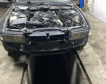 Чорний БМВ 7 Серія, об'ємом двигуна 4 л та пробігом 396 тис. км за 1999 $, фото 2 на Automoto.ua