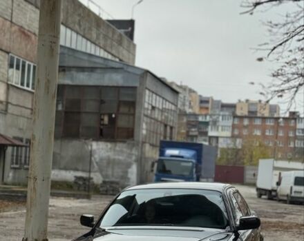 Черный БМВ 7 Серия, объемом двигателя 3 л и пробегом 480 тыс. км за 4950 $, фото 1 на Automoto.ua