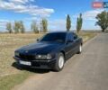 Черный БМВ 7 Серия, объемом двигателя 3.5 л и пробегом 363 тыс. км за 5500 $, фото 1 на Automoto.ua