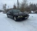 Черный БМВ 7 Серия, объемом двигателя 3.5 л и пробегом 376 тыс. км за 4600 $, фото 1 на Automoto.ua