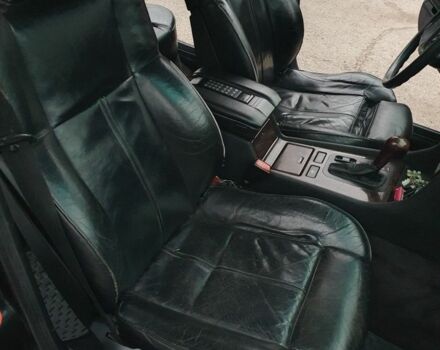 Черный БМВ 7 Серия, объемом двигателя 3 л и пробегом 248 тыс. км за 4000 $, фото 4 на Automoto.ua