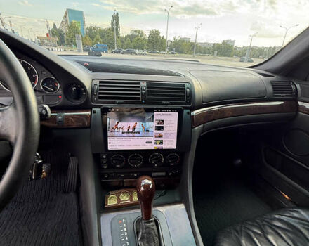 Черный БМВ 7 Серия, объемом двигателя 4 л и пробегом 312 тыс. км за 6700 $, фото 7 на Automoto.ua