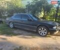 Черный БМВ 7 Серия, объемом двигателя 3.4 л и пробегом 100 тыс. км за 2700 $, фото 1 на Automoto.ua