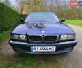 Черный БМВ 7 Серия, объемом двигателя 4.4 л и пробегом 350 тыс. км за 5500 $, фото 1 на Automoto.ua