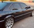 Черный БМВ 7 Серия, объемом двигателя 4.4 л и пробегом 286 тыс. км за 6900 $, фото 1 на Automoto.ua