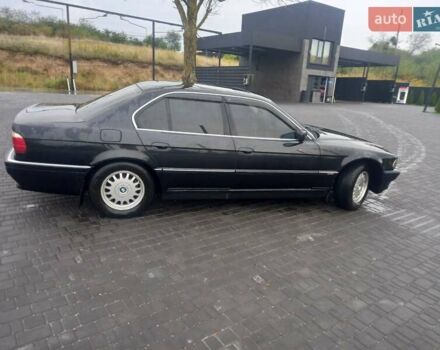 Черный БМВ 7 Серия, объемом двигателя 2.8 л и пробегом 300 тыс. км за 7500 $, фото 6 на Automoto.ua