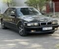Черный БМВ 7 Серия, объемом двигателя 4 л и пробегом 600 тыс. км за 3200 $, фото 1 на Automoto.ua