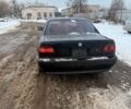 Черный БМВ 7 Серия, объемом двигателя 3.5 л и пробегом 300 тыс. км за 2550 $, фото 1 на Automoto.ua