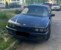 Черный БМВ 7 Серия, объемом двигателя 4.4 л и пробегом 450 тыс. км за 6500 $, фото 1 на Automoto.ua
