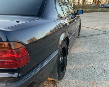 Черный БМВ 7 Серия, объемом двигателя 3 л и пробегом 310 тыс. км за 5000 $, фото 6 на Automoto.ua