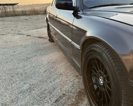 Черный БМВ 7 Серия, объемом двигателя 3 л и пробегом 310 тыс. км за 5000 $, фото 5 на Automoto.ua