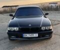 Черный БМВ 7 Серия, объемом двигателя 3 л и пробегом 310 тыс. км за 5000 $, фото 1 на Automoto.ua