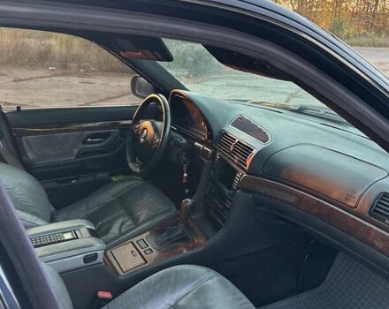 Черный БМВ 7 Серия, объемом двигателя 3 л и пробегом 310 тыс. км за 5000 $, фото 12 на Automoto.ua