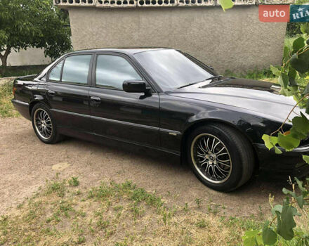 Черный БМВ 7 Серия, объемом двигателя 4.4 л и пробегом 447 тыс. км за 7500 $, фото 6 на Automoto.ua