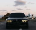 Черный БМВ 7 Серия, объемом двигателя 4.4 л и пробегом 400 тыс. км за 4799 $, фото 1 на Automoto.ua