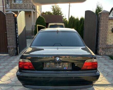Черный БМВ 7 Серия, объемом двигателя 4.4 л и пробегом 300 тыс. км за 4950 $, фото 2 на Automoto.ua