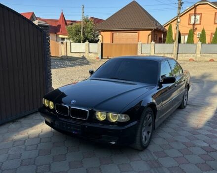 Черный БМВ 7 Серия, объемом двигателя 4.4 л и пробегом 300 тыс. км за 4950 $, фото 1 на Automoto.ua