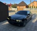 Черный БМВ 7 Серия, объемом двигателя 4.4 л и пробегом 300 тыс. км за 4950 $, фото 1 на Automoto.ua