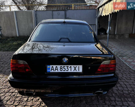 Черный БМВ 7 Серия, объемом двигателя 3.5 л и пробегом 370 тыс. км за 12000 $, фото 5 на Automoto.ua