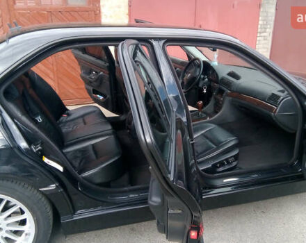 Черный БМВ 7 Серия, объемом двигателя 3.5 л и пробегом 370 тыс. км за 12000 $, фото 3 на Automoto.ua