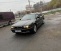 Черный БМВ 7 Серия, объемом двигателя 4.4 л и пробегом 380 тыс. км за 1999 $, фото 2 на Automoto.ua