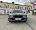 Черный БМВ 7 Серия, объемом двигателя 4.4 л и пробегом 380 тыс. км за 5800 $, фото 1 на Automoto.ua