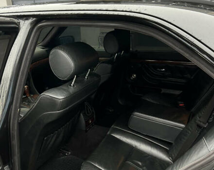 Черный БМВ 7 Серия, объемом двигателя 4.4 л и пробегом 400 тыс. км за 5499 $, фото 13 на Automoto.ua