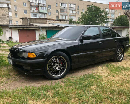 Черный БМВ 7 Серия, объемом двигателя 4.4 л и пробегом 447 тыс. км за 7500 $, фото 2 на Automoto.ua