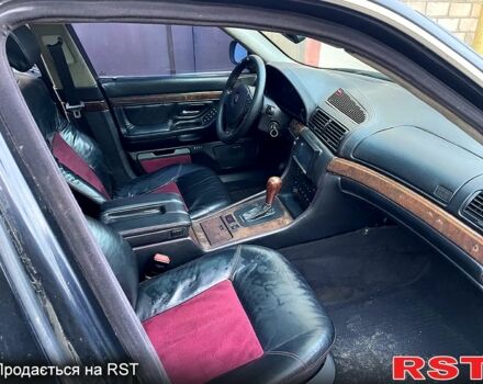 Черный БМВ 7 Серия, объемом двигателя 5.4 л и пробегом 400 тыс. км за 6000 $, фото 2 на Automoto.ua