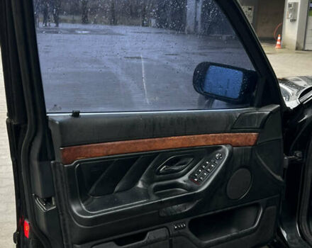 Черный БМВ 7 Серия, объемом двигателя 4.4 л и пробегом 400 тыс. км за 5499 $, фото 10 на Automoto.ua