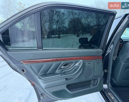 Чорний БМВ 7 Серія, об'ємом двигуна 4.4 л та пробігом 409 тис. км за 9200 $, фото 16 на Automoto.ua