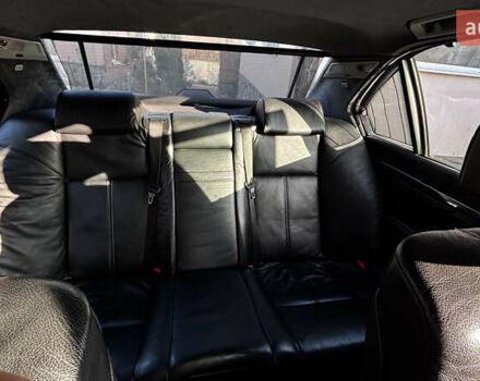 Черный БМВ 7 Серия, объемом двигателя 3.5 л и пробегом 370 тыс. км за 12000 $, фото 16 на Automoto.ua