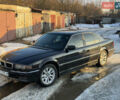 Черный БМВ 7 Серия, объемом двигателя 4.4 л и пробегом 200 тыс. км за 3900 $, фото 1 на Automoto.ua