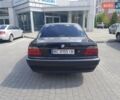 Черный БМВ 7 Серия, объемом двигателя 2.93 л и пробегом 530 тыс. км за 7200 $, фото 1 на Automoto.ua