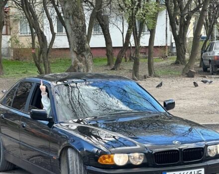 Чорний БМВ 7 Серія, об'ємом двигуна 4.4 л та пробігом 300 тис. км за 8500 $, фото 1 на Automoto.ua